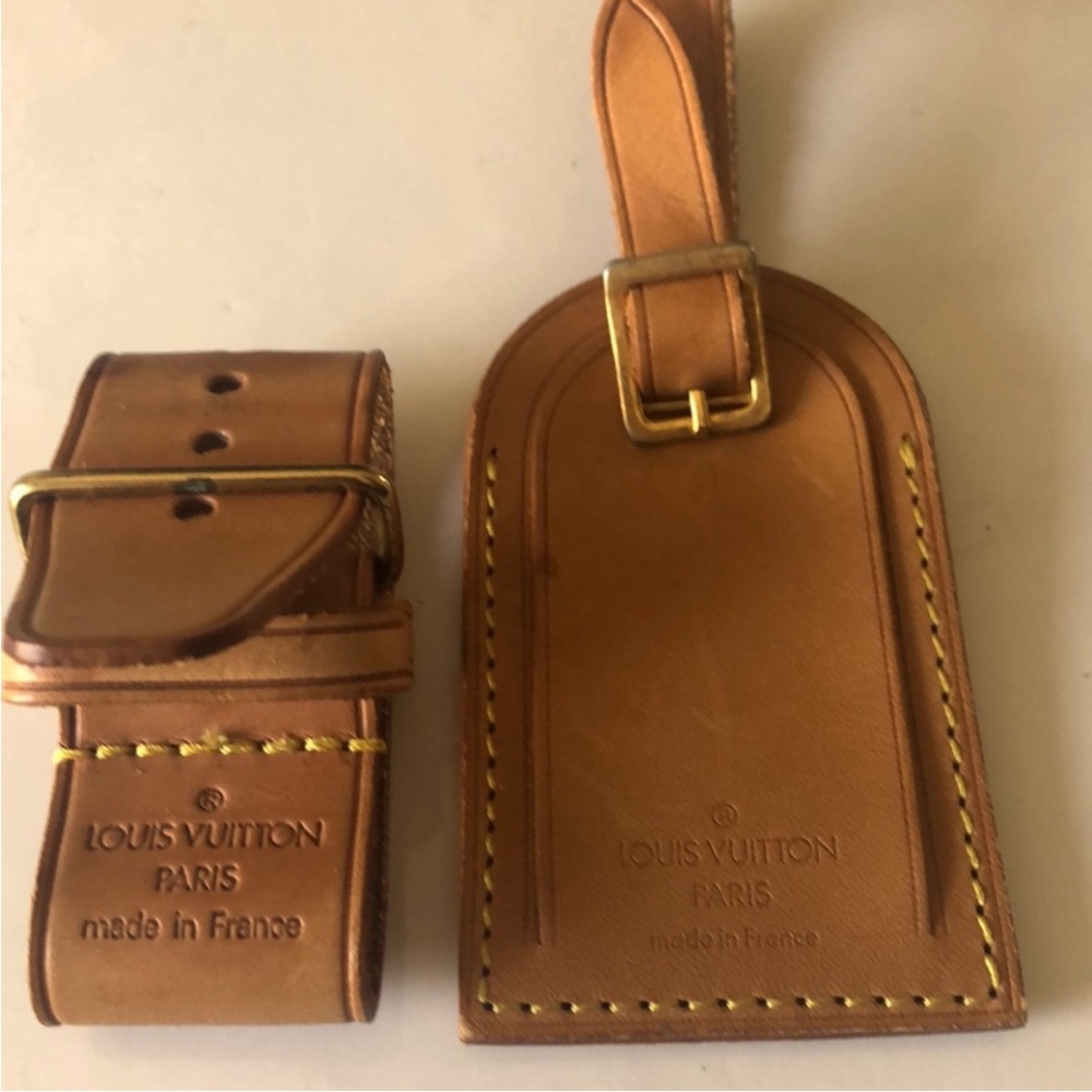 Authentic Louis Vuitton Leather Luggage Tag and Poignet Set.